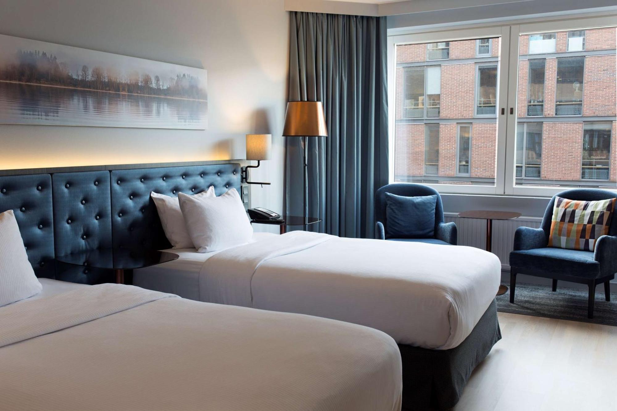 Hilton Helsinki Strand Buitenkant foto A room at the hotel